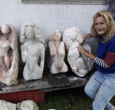 Nicole with sculptures.jpg